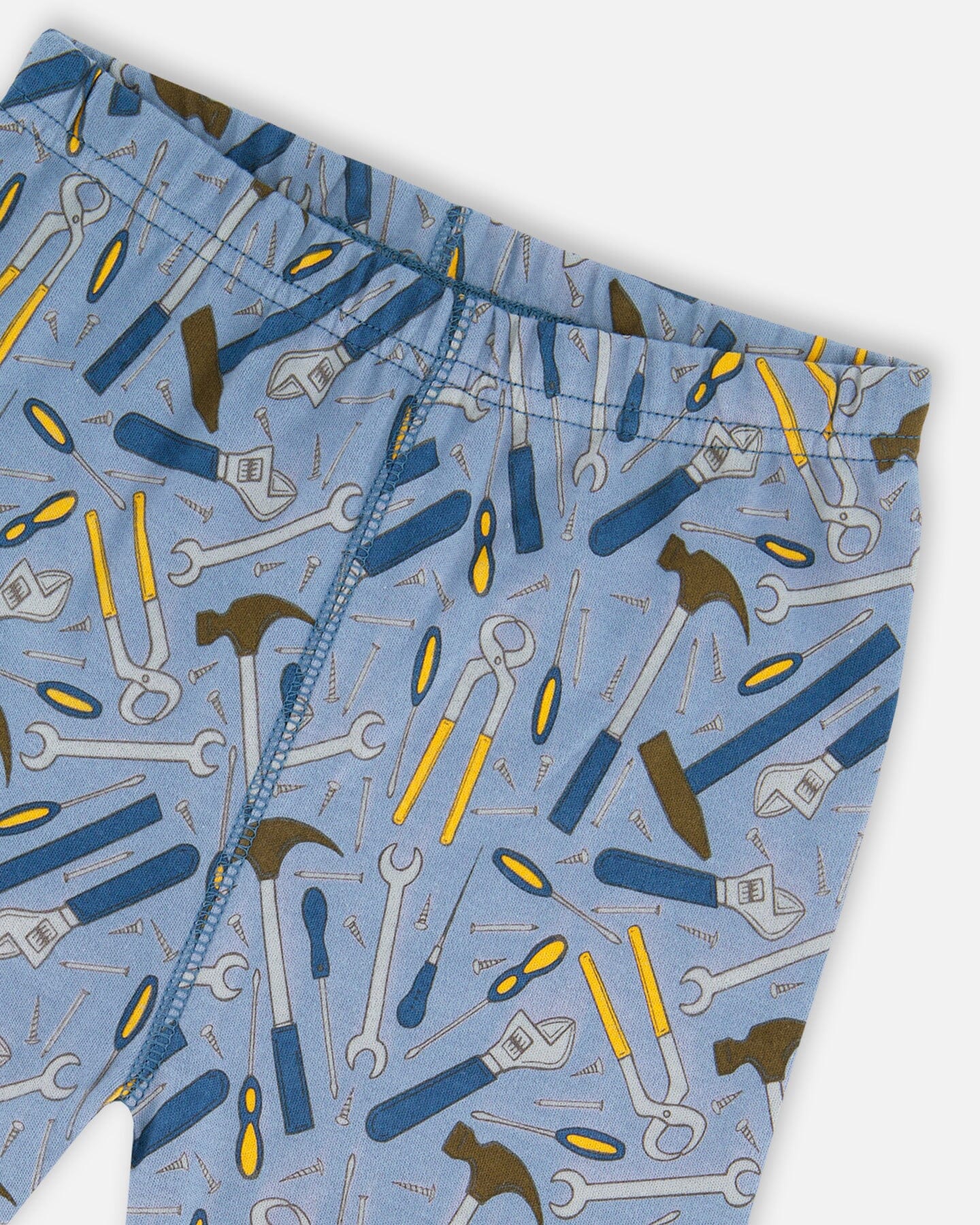 Organic Cotton Long Sleeve Top And Pants Two-Piece Pajama Set Tools On Bluish Gray Background Pajamas Deux par Deux 