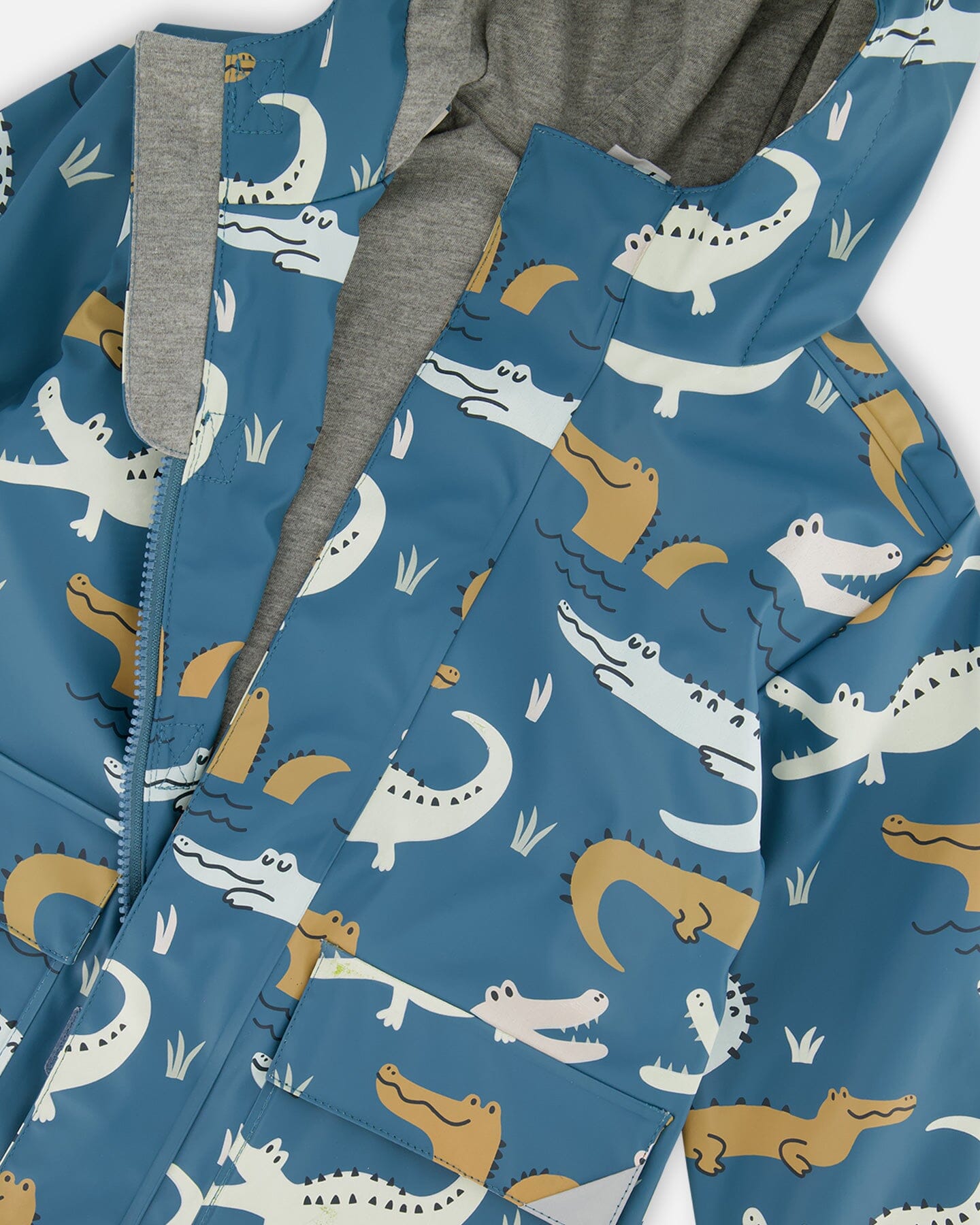 Blue Raincoat With Crocodiles That Change Color Upon Contact With Water Outerwear Deux par Deux 