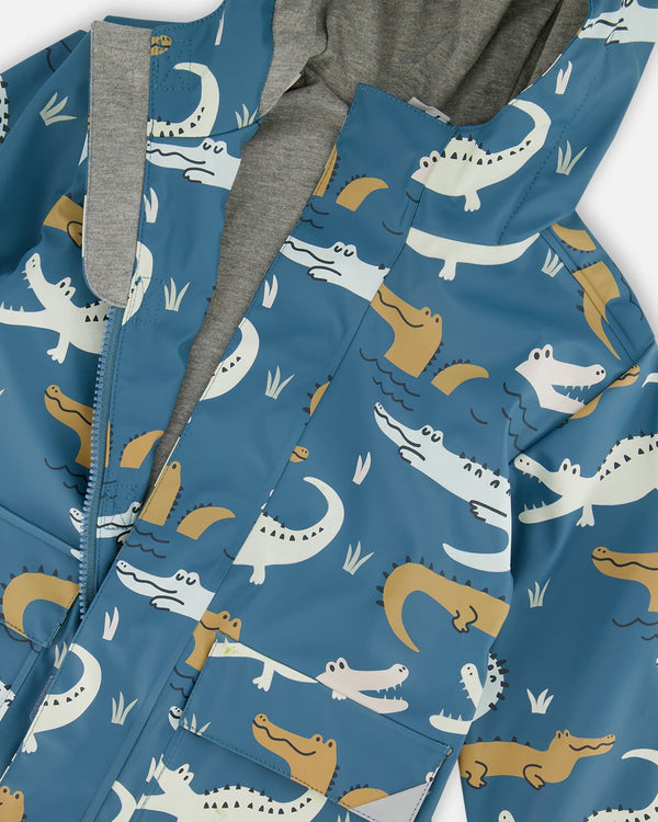 Blue Raincoat With Crocodiles That Change Color Upon Contact With Water Outerwear Deux par Deux 